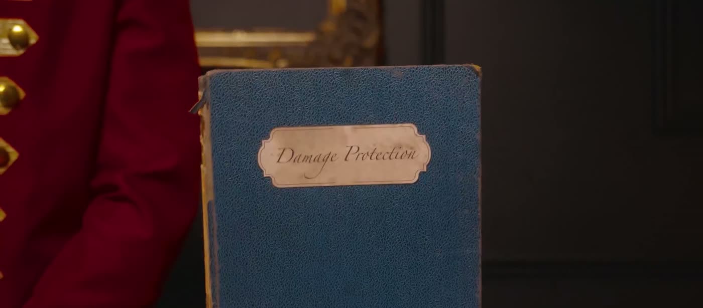 The bellhop holding a Safeguest Protect ledger